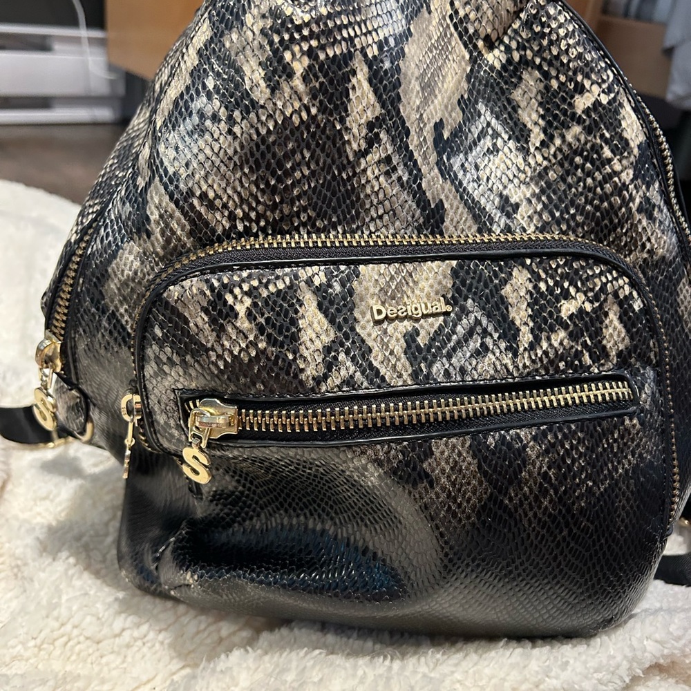 Desigual napsack also have matching wallet